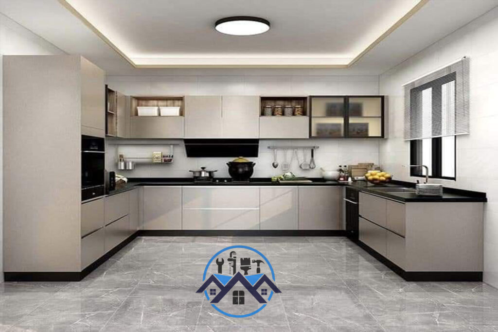 Modern kitchen with sleek cabinets and marble countertops installed by Waterworld Technology Limited in Ghana.