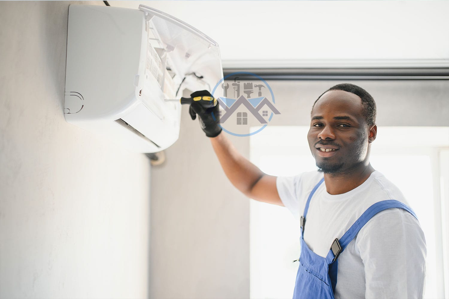 Professional AC installation in Ghana by Waterworld Technology Limited – certified technicians installing air conditioner.
